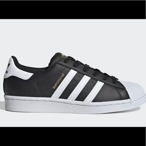 Adidas Black and White Superstar woman’s size 9